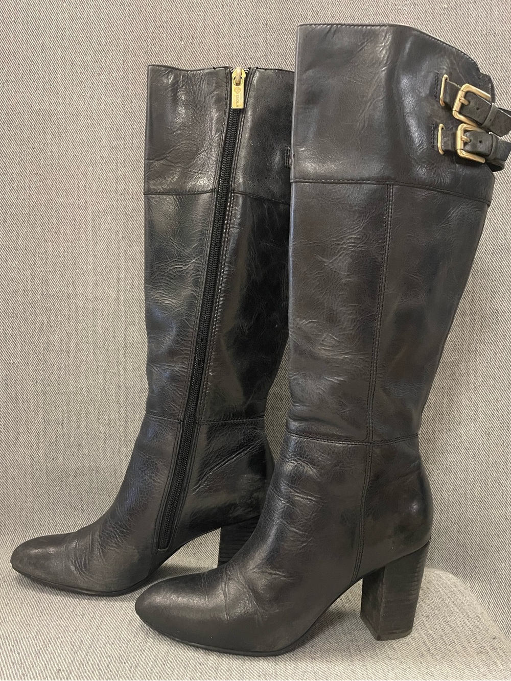 Beautiful Isola Black Leather Knee-High Boots with Buckle Accent